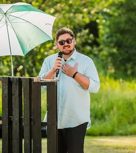 Andy speaking at an event